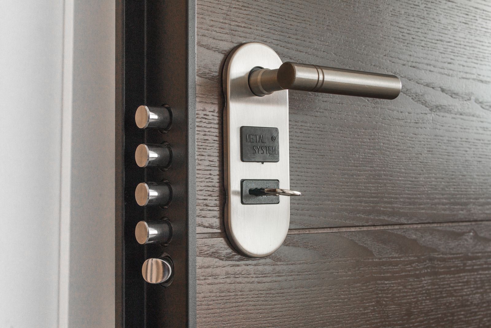 Key inserted into a metal door lock